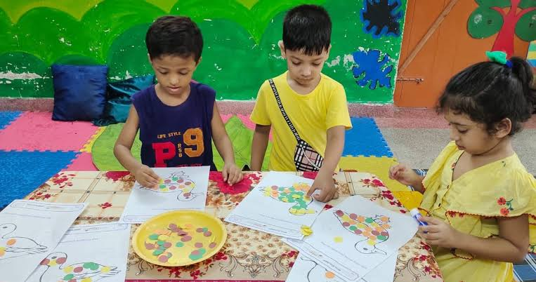 Children working together during a social skills activity